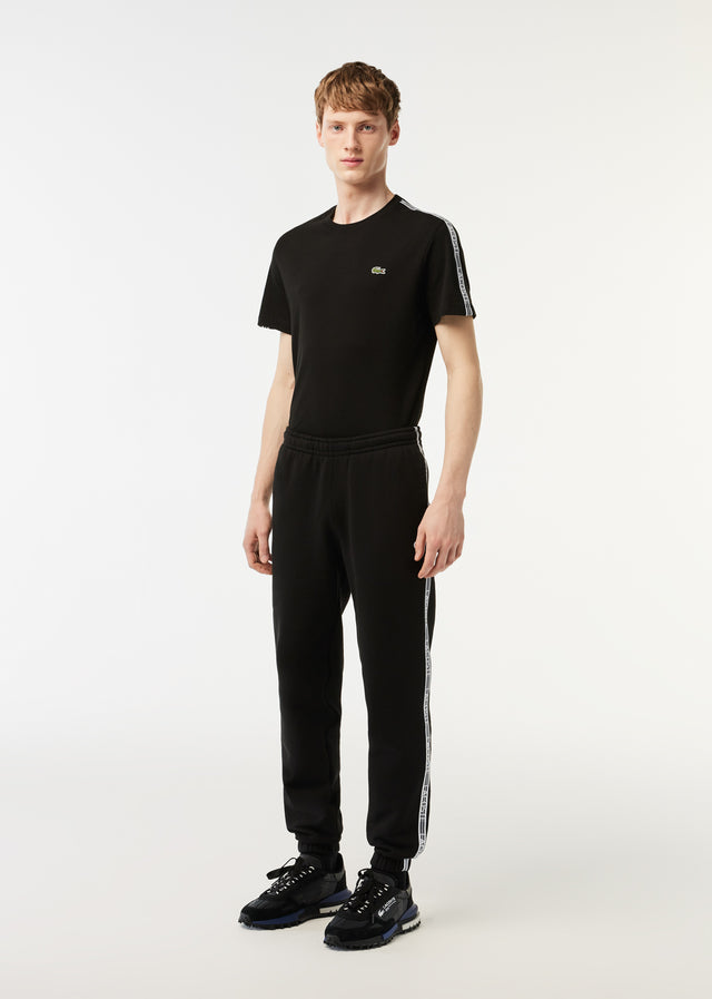 Lacoste Hosen Contrast stripe tracksuit trousers - black