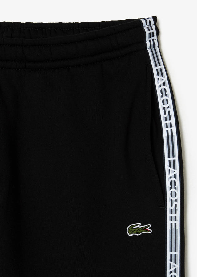 Lacoste Hosen  Contrast stripe tracksuit trousers - black 