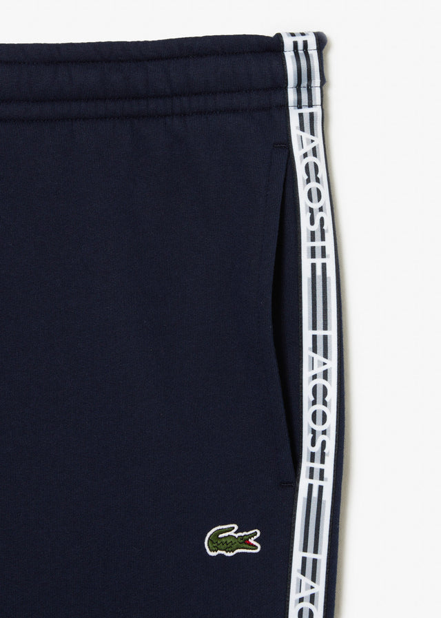 Lacoste Hosen  Contrast stripe tracksuit trousers - navy blue 