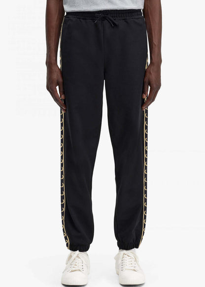 Fred Perry Joggingbroeken  Seasonal taped track pant - black gold 